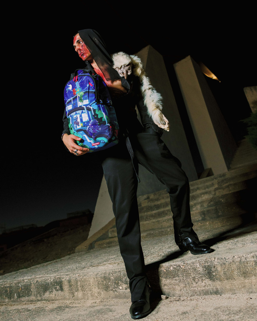 SPRAYGROUND MISFITS AND MISCHIEF BACKPACK