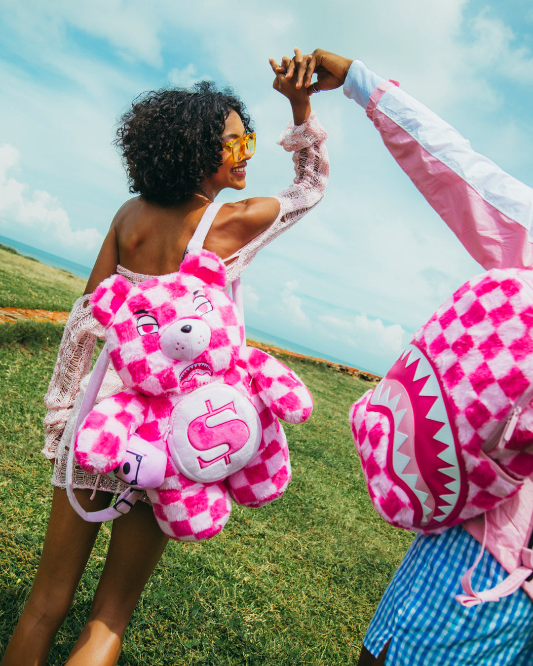 SPRAYGROUND FURZILLA SHARK (PINK CHECK) MONEYBEAR BACKPACK