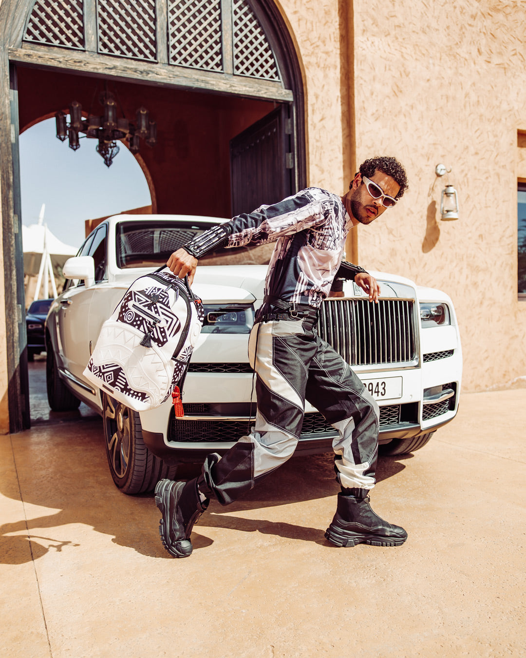 SPRAYGROUND A.I.8 AFRICAN INTELLIGENCE - ORIGIN STORY BACKPACK (DLXV)