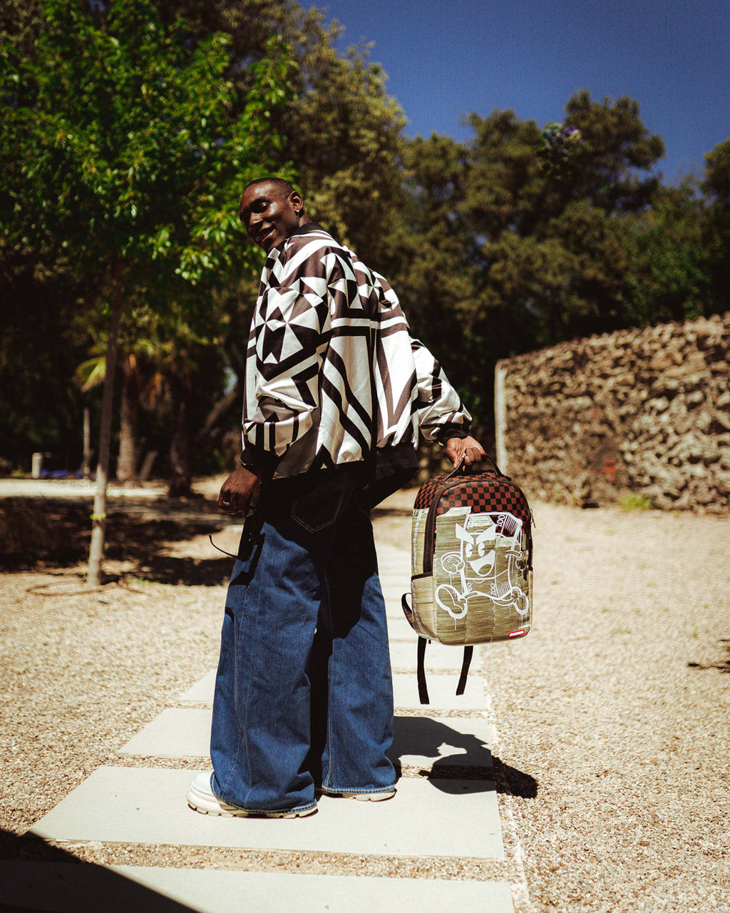 SPRAYGROUND MONEY ON THE RUN BACKPACK (DLXV)