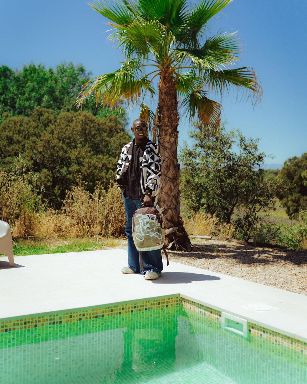 SPRAYGROUND MONEY ON THE RUN BACKPACK (DLXV)