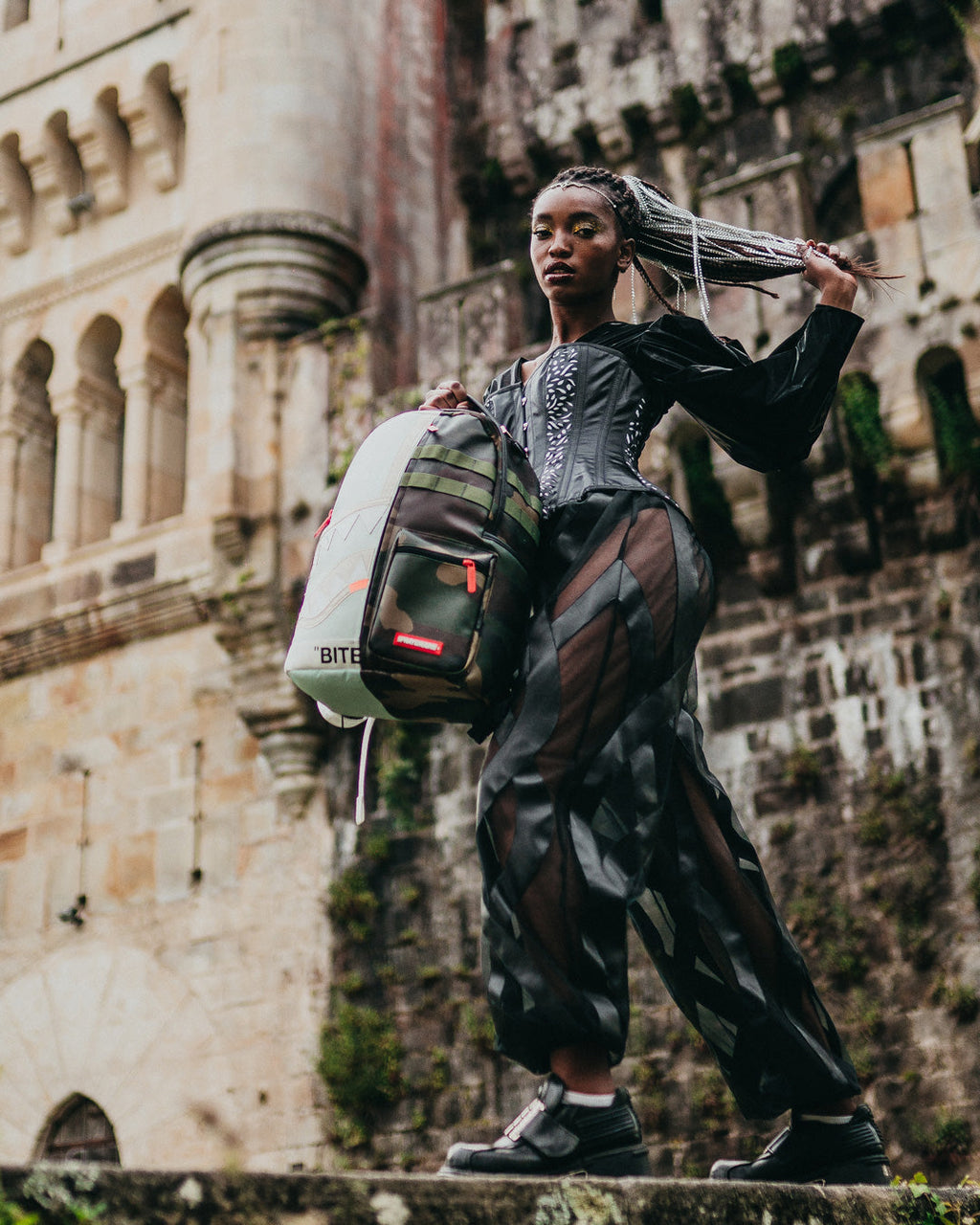 SPRAYGROUND SPLIT WEIRD BACKPACK (DLXV)
