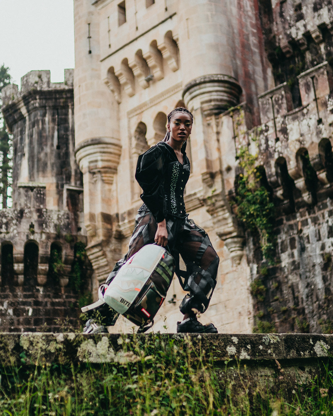 SPRAYGROUND SPLIT WEIRD BACKPACK (DLXV)