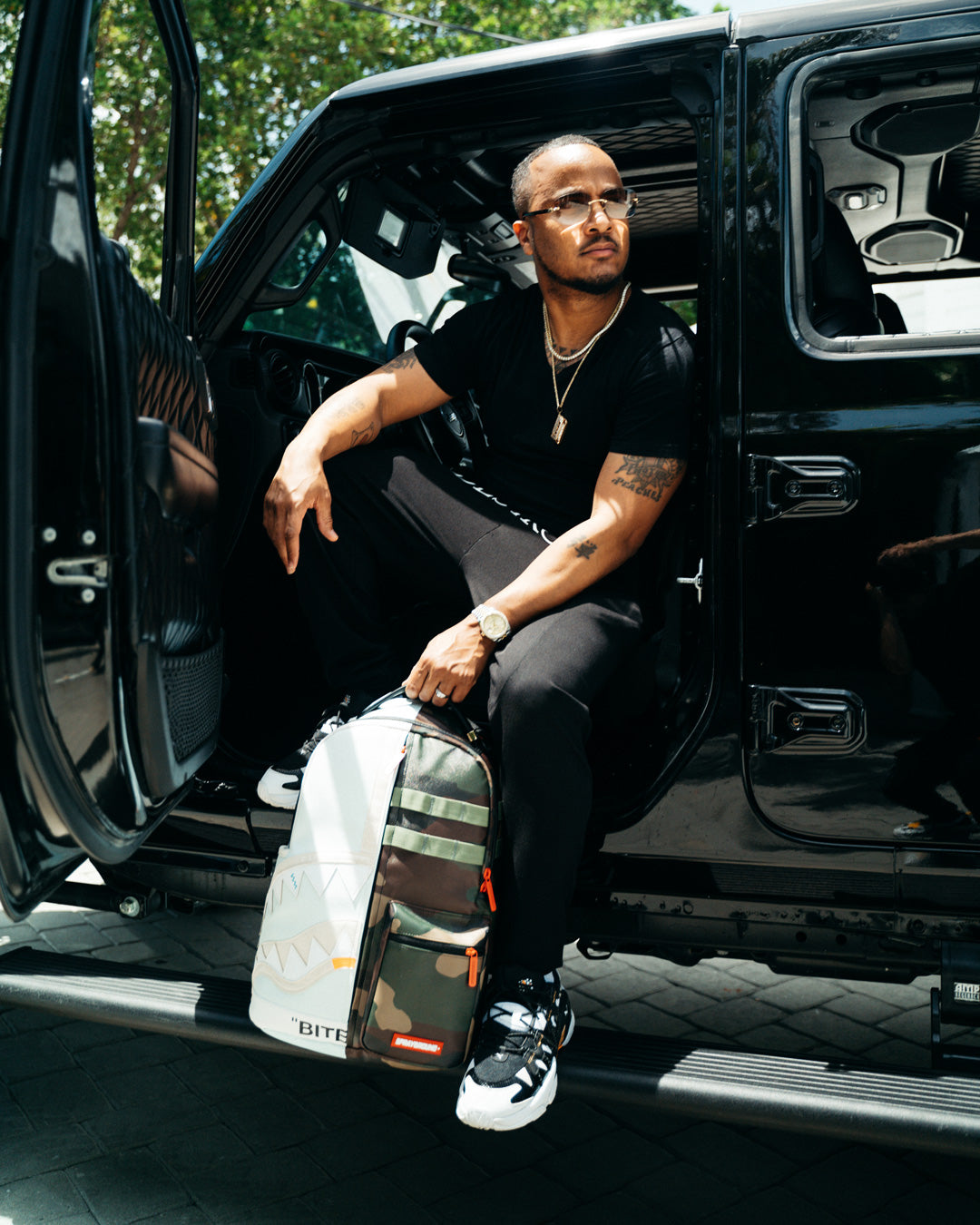 SPRAYGROUND SPLIT WEIRD BACKPACK (DLXV)