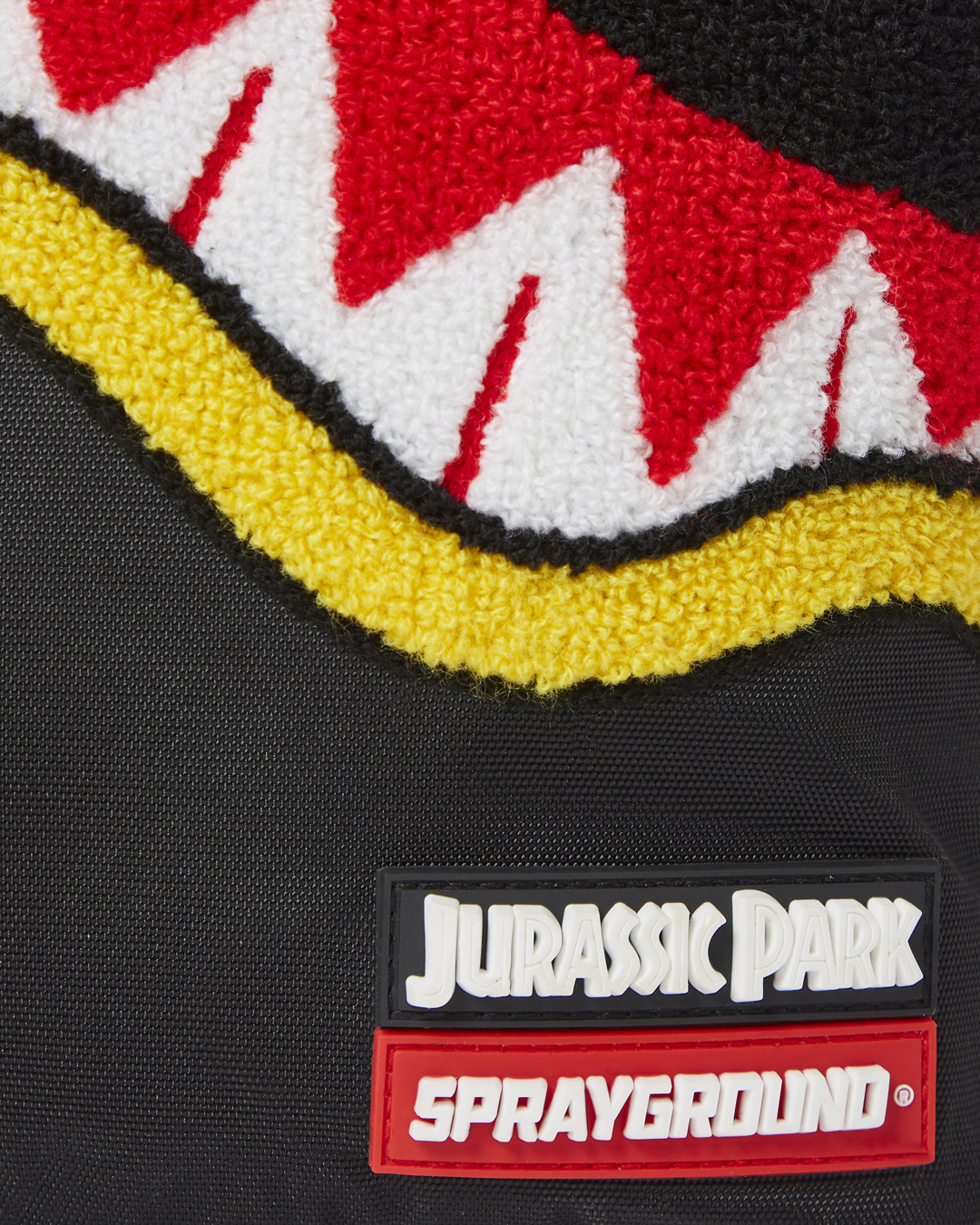 SPRAYGROUND JURASSIC PARK SHARK "CHENILLE SHARK" BACKPACK (DLXR)