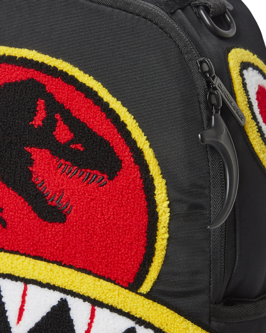 SPRAYGROUND JURASSIC PARK SHARK "CHENILLE SHARK" BACKPACK (DLXR)