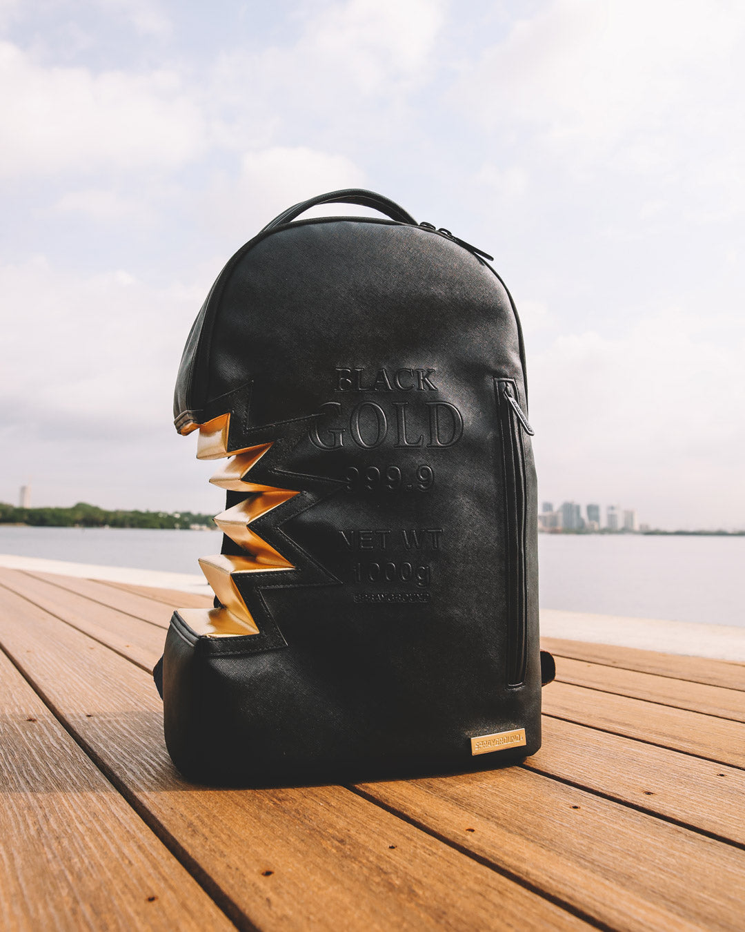 SPRAYGROUND A.i.3 SHARK BITE BLACK GOLD BACKPACK (DLXV)