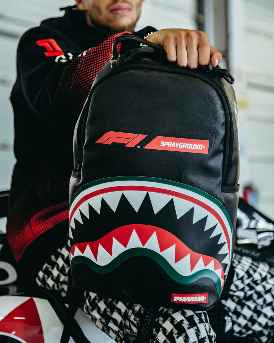 SPRAYGROUND FORMULA 1 OFFICIAL RACE TEAM BACKPACK (DLXV)
