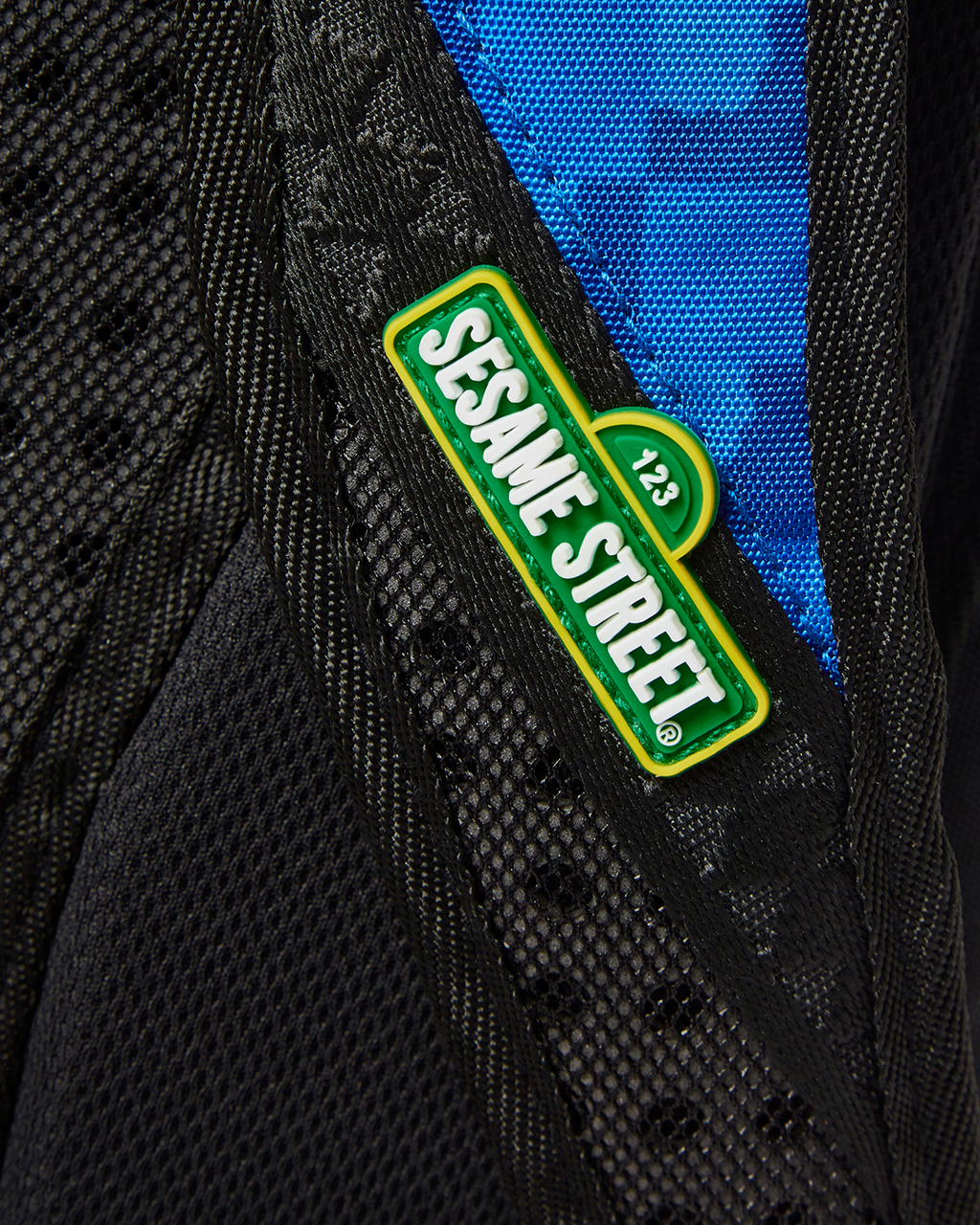 SPRAYGROUND COOKIE MONSTER SLEEPING BACKPACK (DLXR)