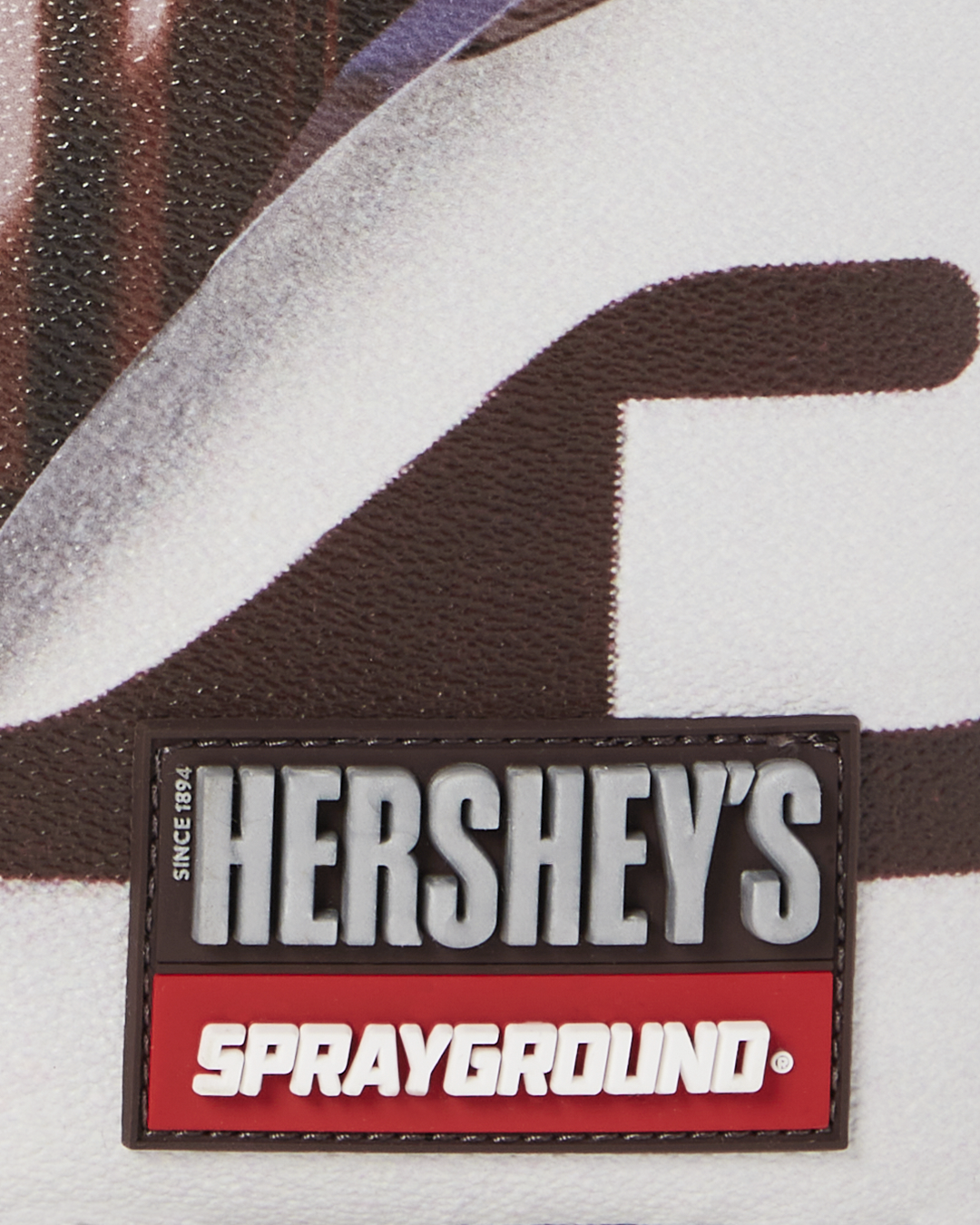 SPRAYGROUND HERSHEY’S SHARK BITE BACKPACK