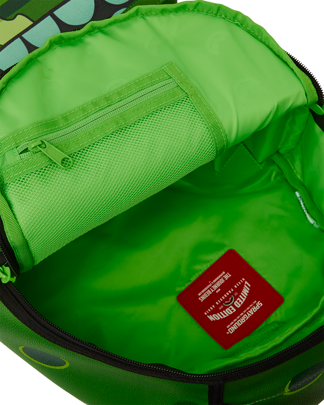 SPRAYGROUND RICK & MORTY PICKLE SHARKBITE BACKPACK (DLXV)