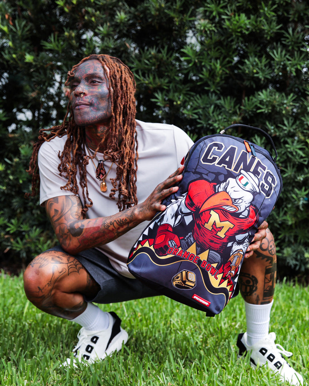SPRAYGROUND CANES MUSCLE UNIVERSITY OF MIAMI BACKPACK (WITH WARREN SAPP)