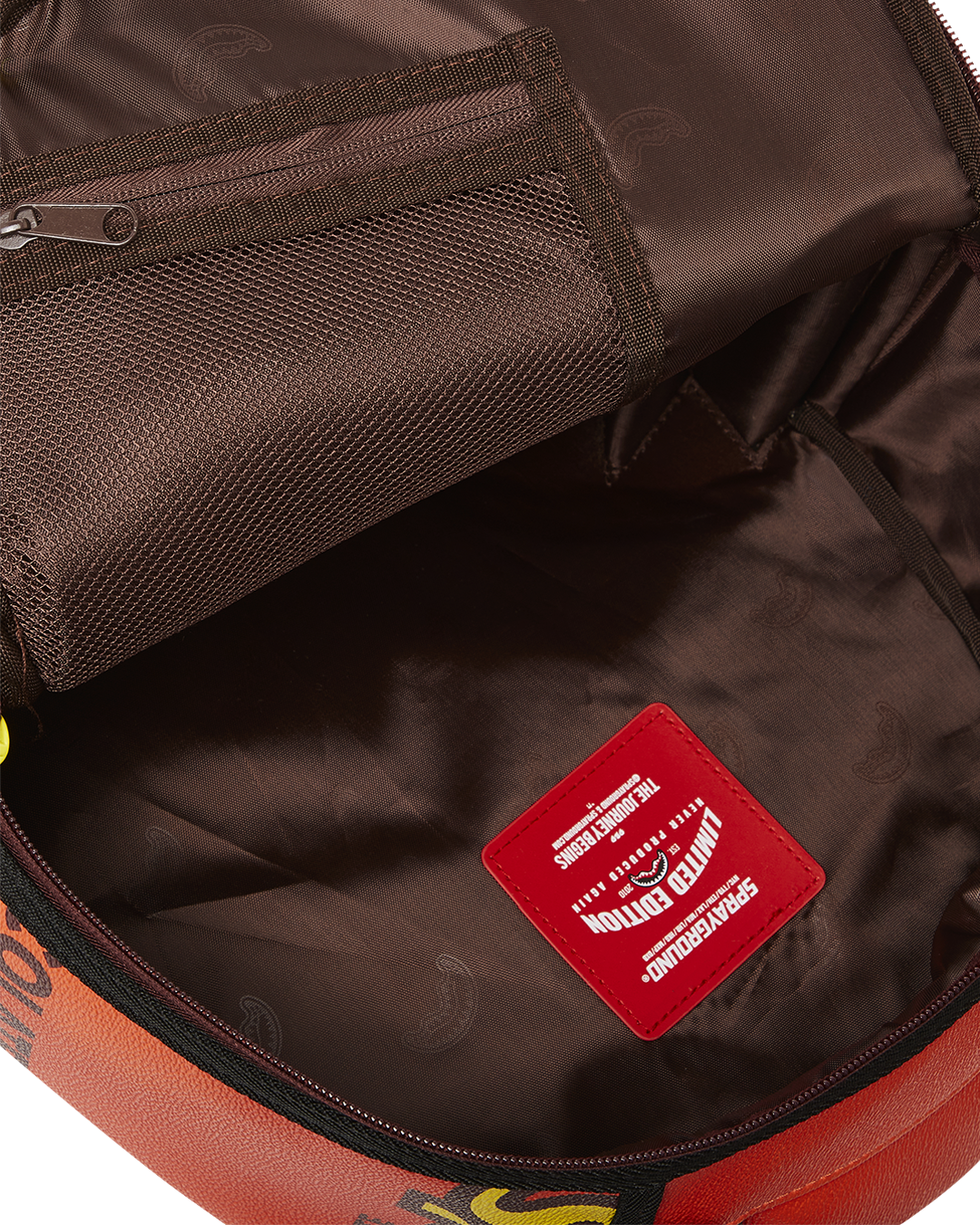 SPRAYGROUND REESE'S SHARK BITE BACKPACK (DLXV)