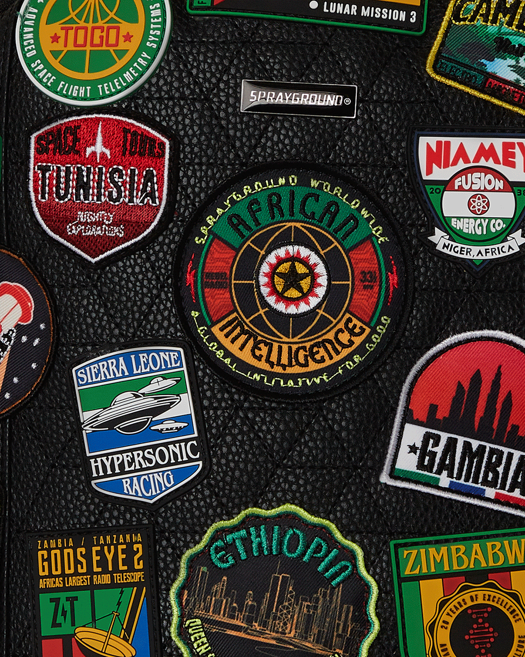 SPRAYGROUND A.I. THE 54 (PATCHES OF AFRICA) CARGO BACKPACK