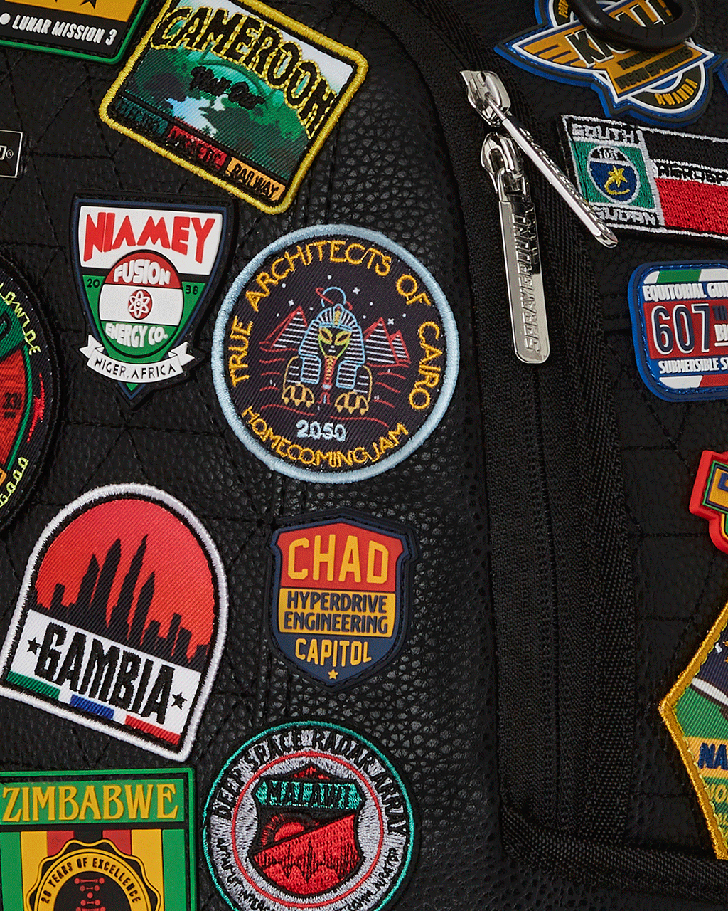 SPRAYGROUND A.I. THE 54 (PATCHES OF AFRICA) CARGO BACKPACK