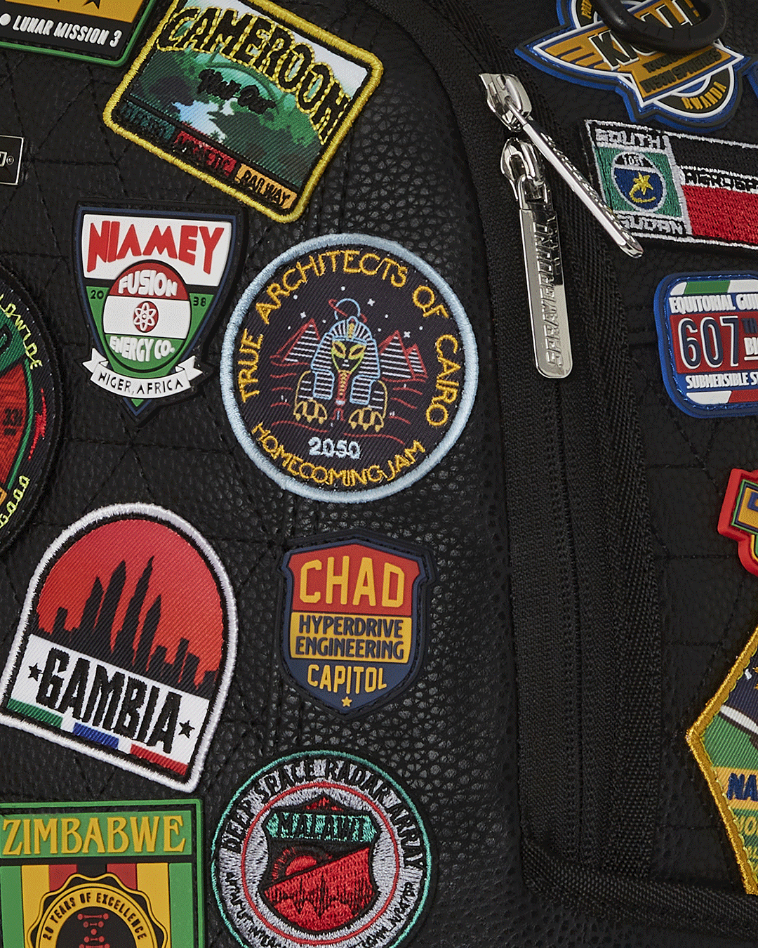 SPRAYGROUND A.I. THE 54 (PATCHES OF AFRICA) CARGO BACKPACK