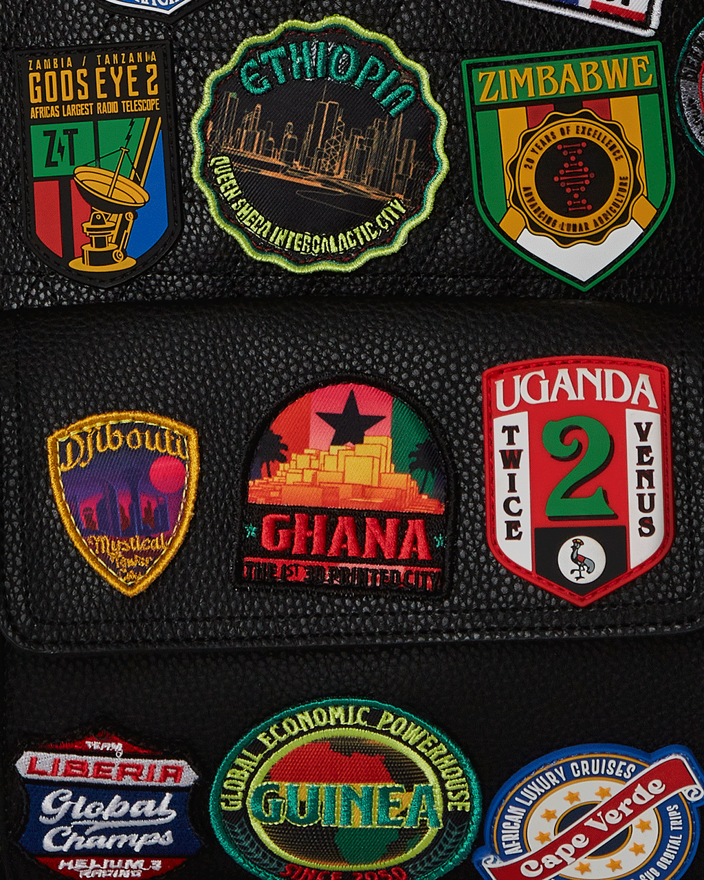 SPRAYGROUND A.I. THE 54 (PATCHES OF AFRICA) CARGO BACKPACK