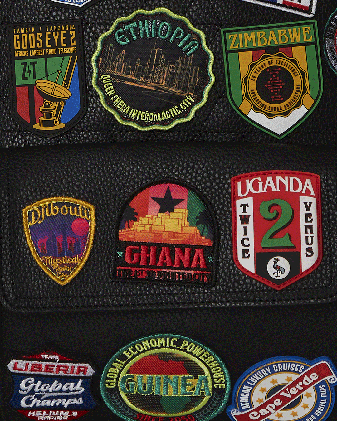 SPRAYGROUND A.I. THE 54 (PATCHES OF AFRICA) CARGO BACKPACK