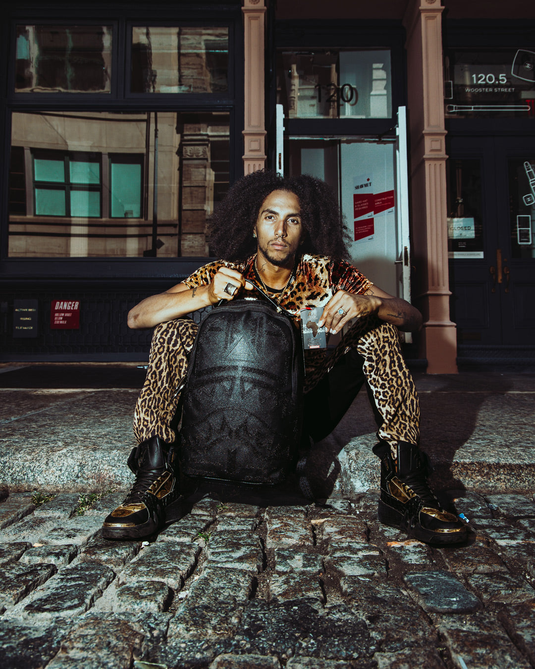 SPRAYGROUND AFRICAN INTELLIGENCE 9 APEX GENIUS BACKPACK - SANDFLOWER COLLAB