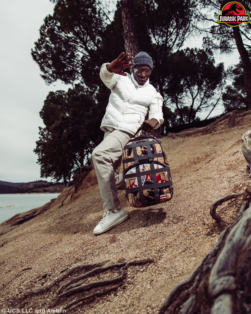 SPRAYGROUND JURASSIC DELIVERY BACKPACK (DLXV)