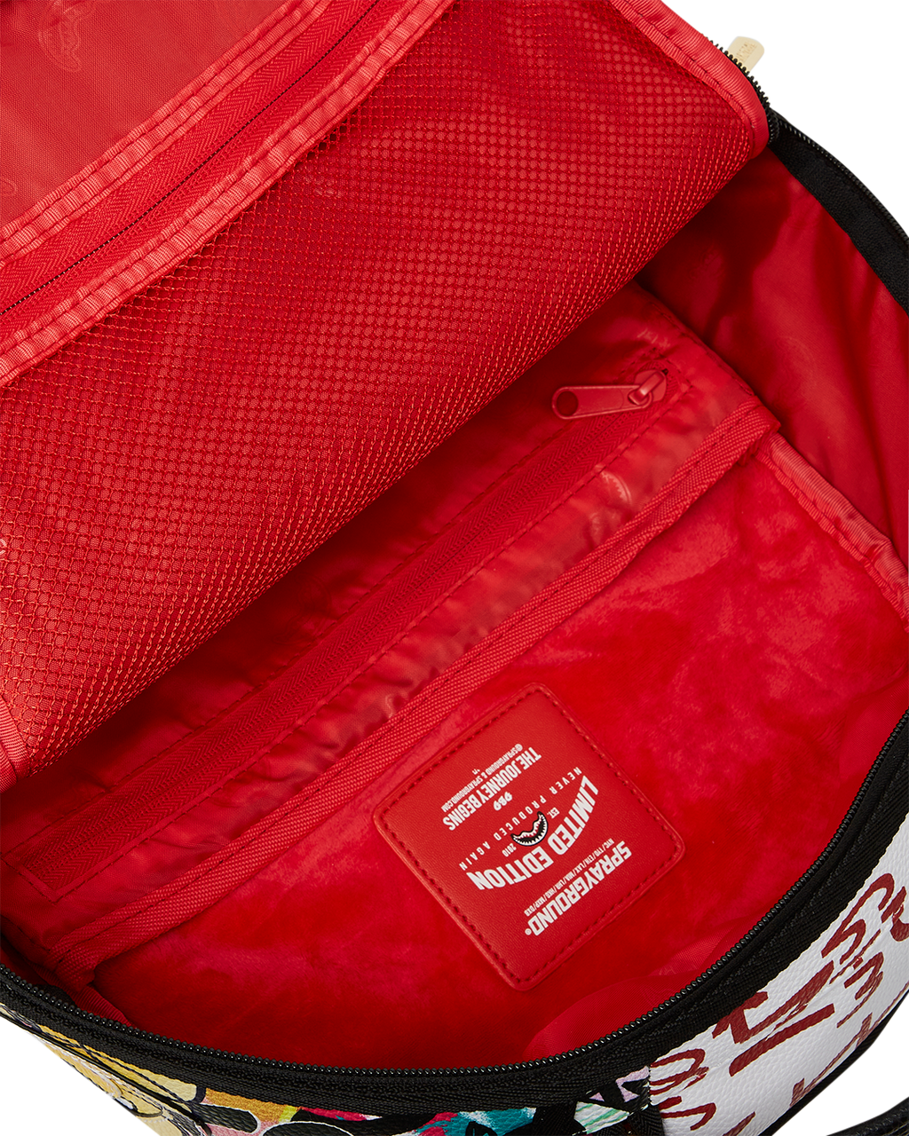 SPRAYGROUND TRI-SPLIT GRAFFITI BACKPACK (DLXV)