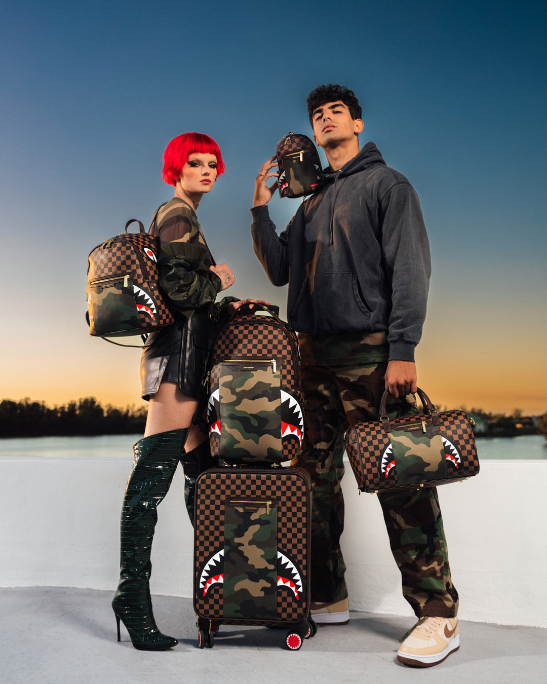 SPRAYGROUND EXTERIOR GOLD ZIP POCKET SHARKS IN PARIS SAVAGE BACKPACK