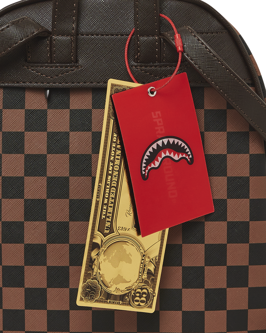 SPRAYGROUND EXTERIOR GOLD ZIP POCKET SHARKS IN PARIS SAVAGE BACKPACK