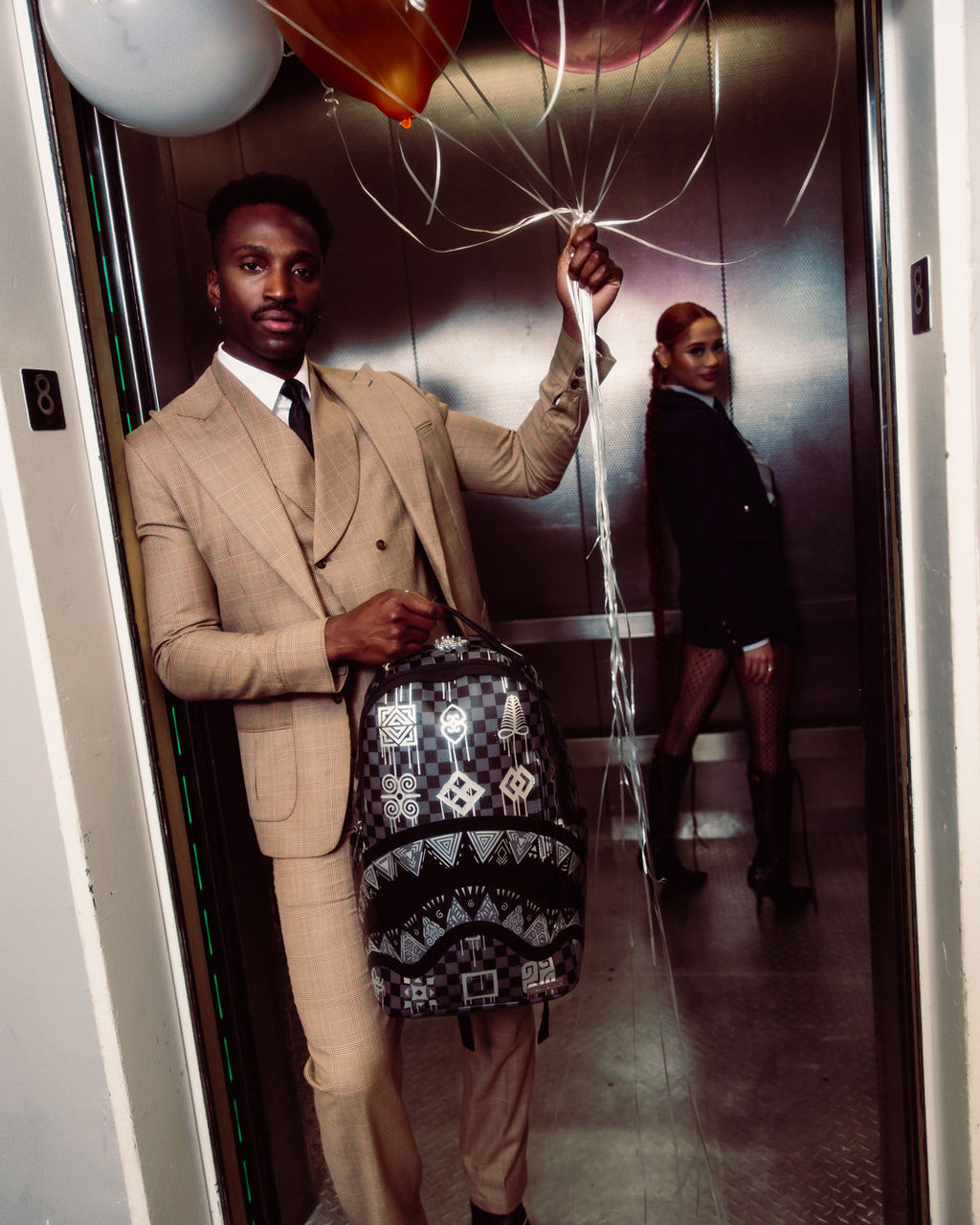 SPRAYGROUND AFRICAN INTELLIGENCE 9 POWER GLYPHICS BACKPACK - SANDFLOWER COLLAB
