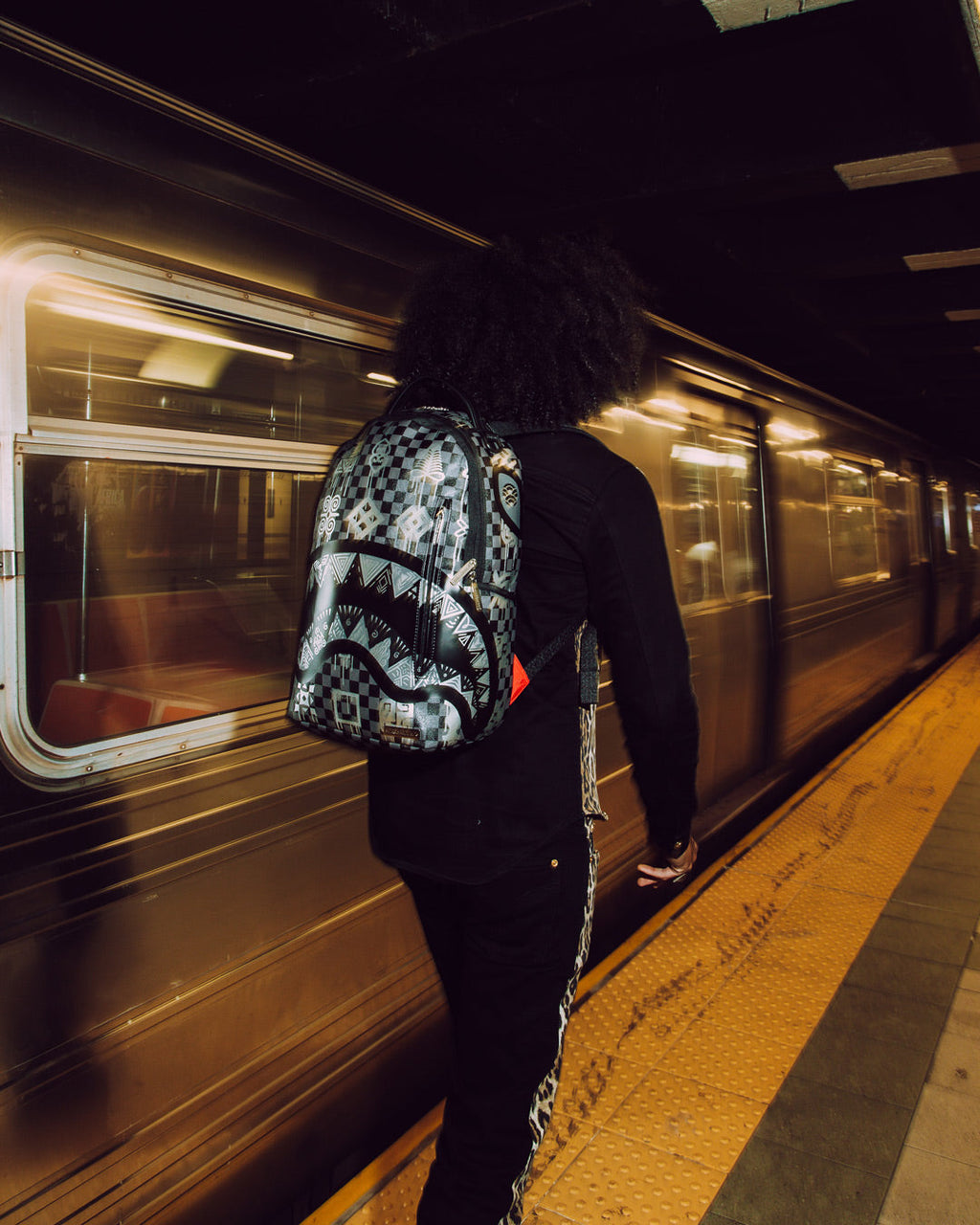 SPRAYGROUND AFRICAN INTELLIGENCE 9 POWER GLYPHICS BACKPACK - SANDFLOWER COLLAB