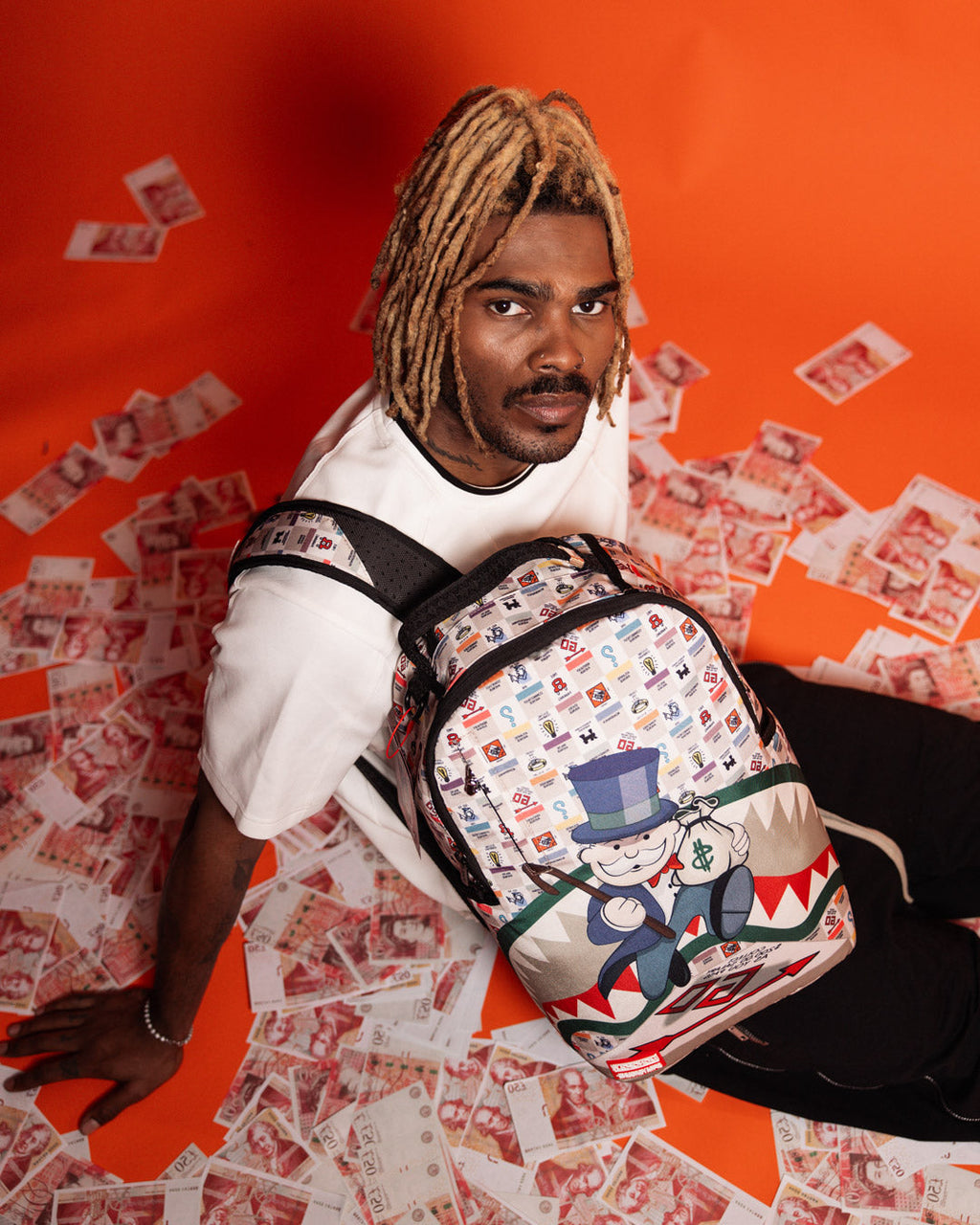 SPRAYGROUND MONOPOLY GOTTA GO DLXSR BACKPACK