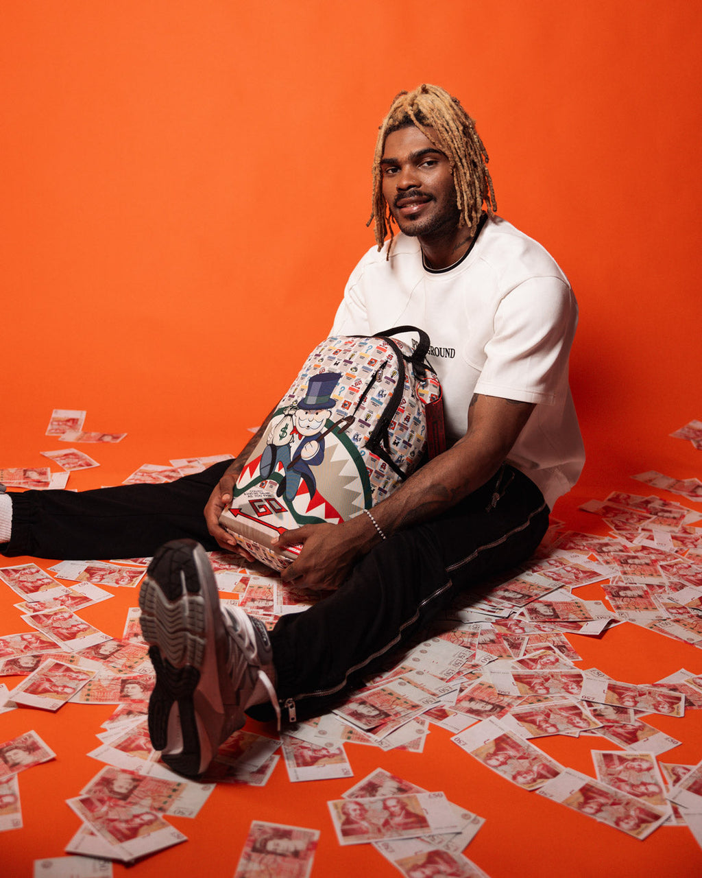 SPRAYGROUND MONOPOLY GOTTA GO DLXSR BACKPACK