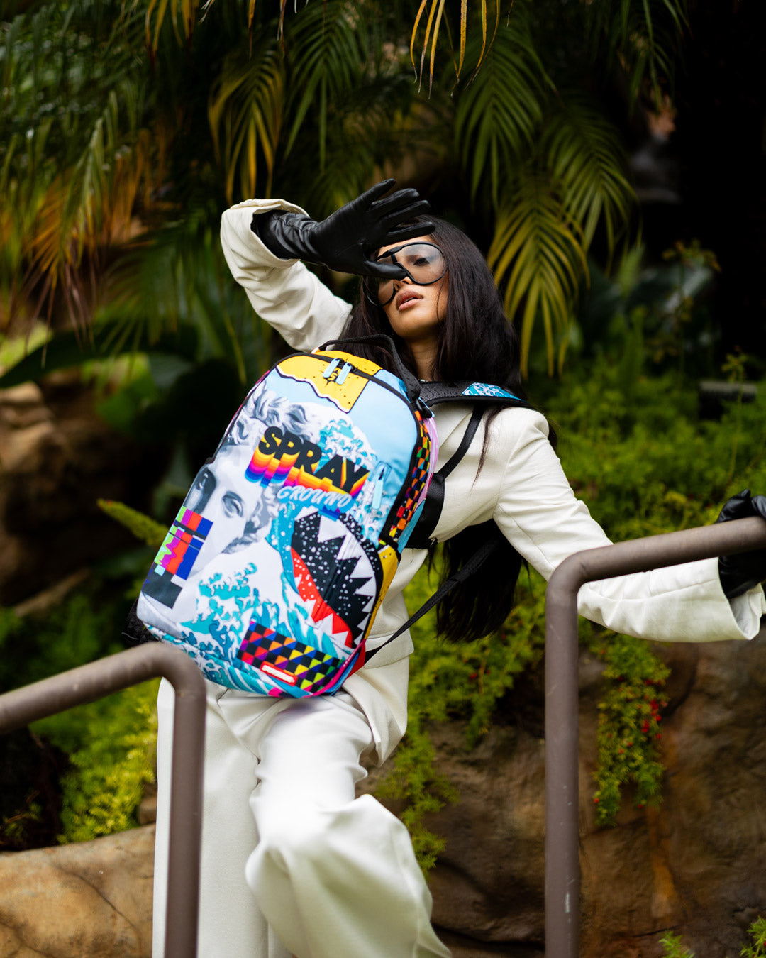 SPRAYGROUND COLLAGE OF RANDOM DLXSR BACKPACK