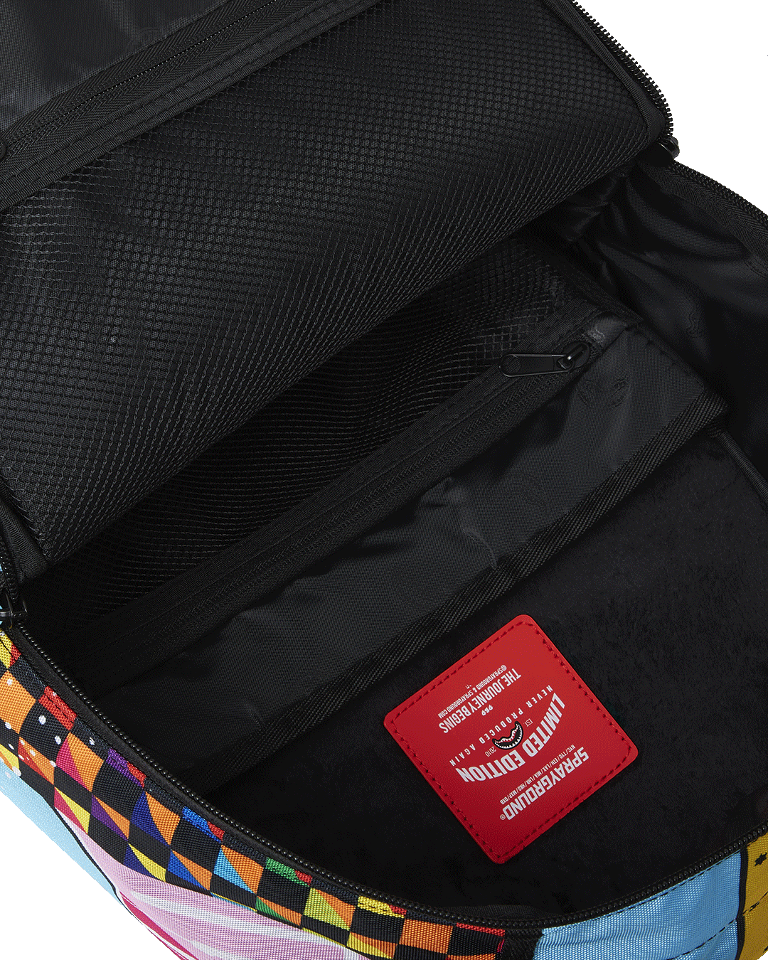 SPRAYGROUND COLLAGE OF RANDOM DLXSR BACKPACK