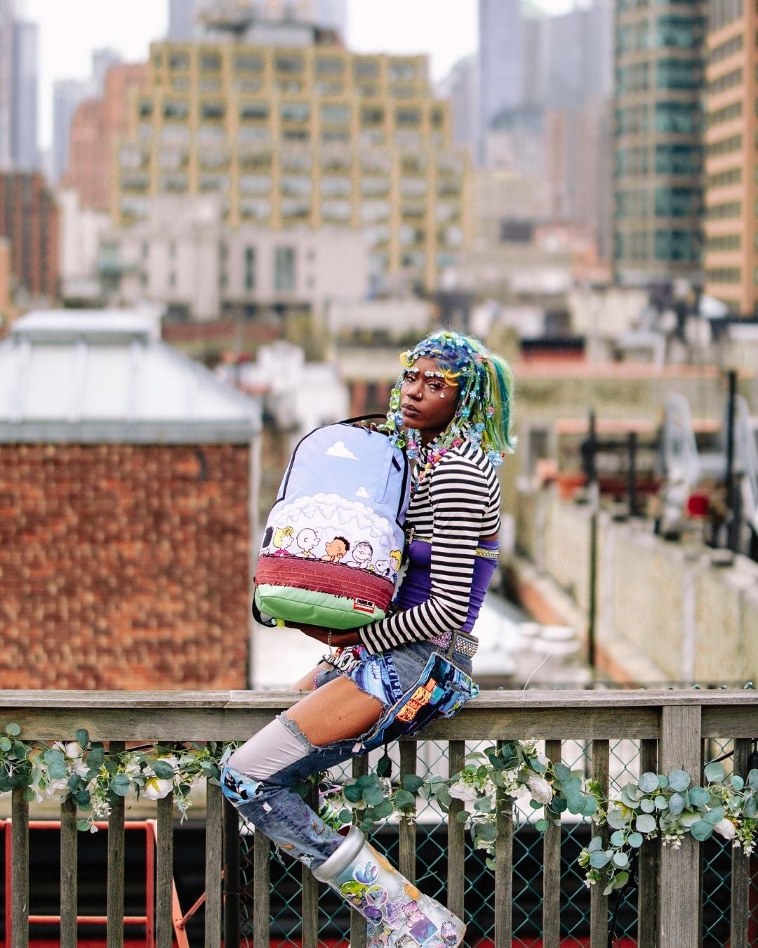 SPRAYGROUND PEANUTS FAM DLXSR BACKPACK