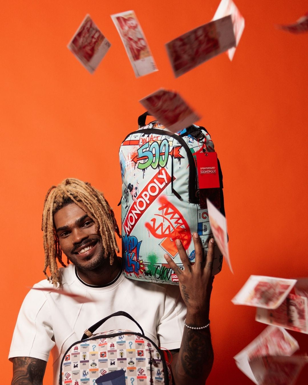 SPRAYGROUND MONOPOLY DO NOT PASS GO DLXSR BACKPACK