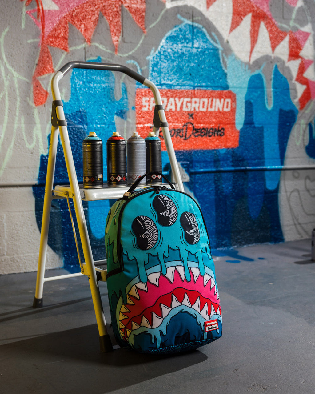 SPRAYGROUND JORGE RODRIGUEZ THE ARTIST COLLAB DRIPS SHARKS BACKPACK