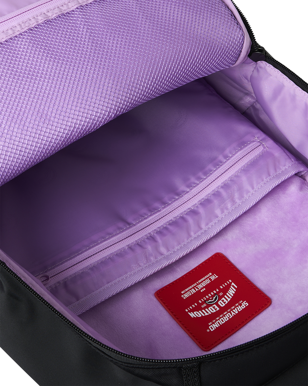 SPRAYGROUND SHARK CENTRAL PASSPORT (PURPLE) BACKPACK