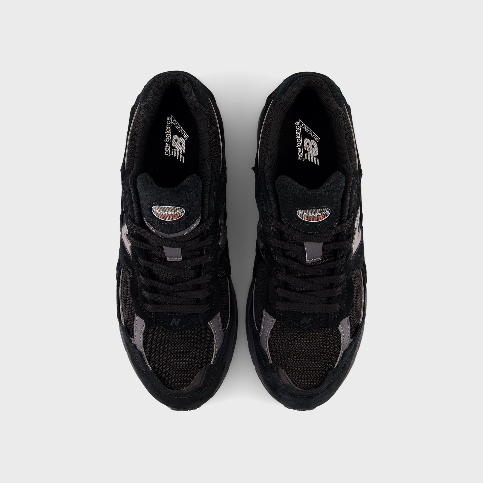 New Balance U2002DX - Black / Magnet