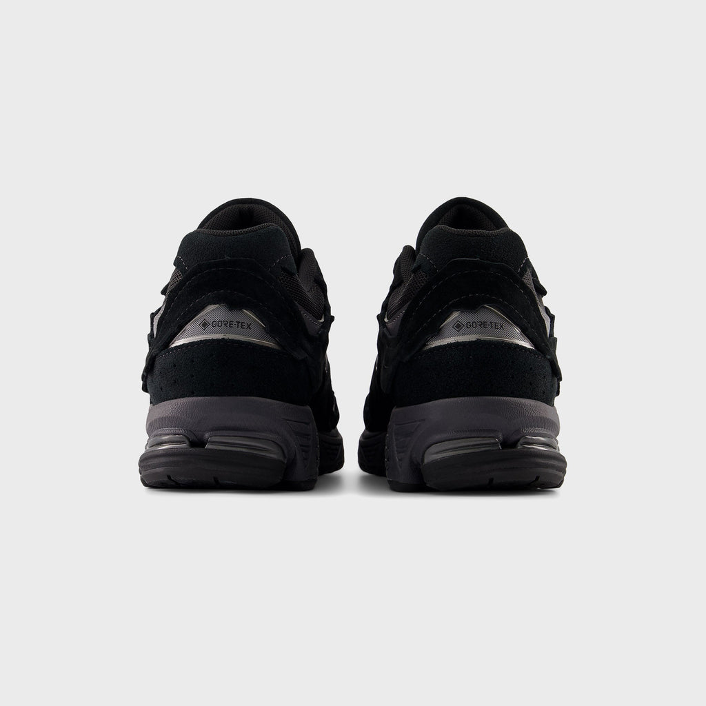 New Balance U2002DX - Black / Magnet