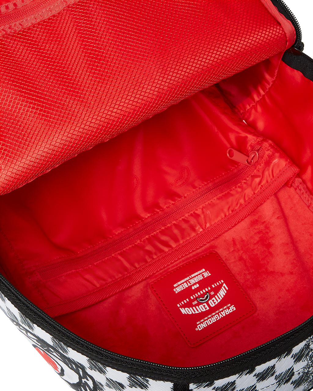 SPRAYGROUND SCRIBBLE DRIBBLE CHECK BACKPACK