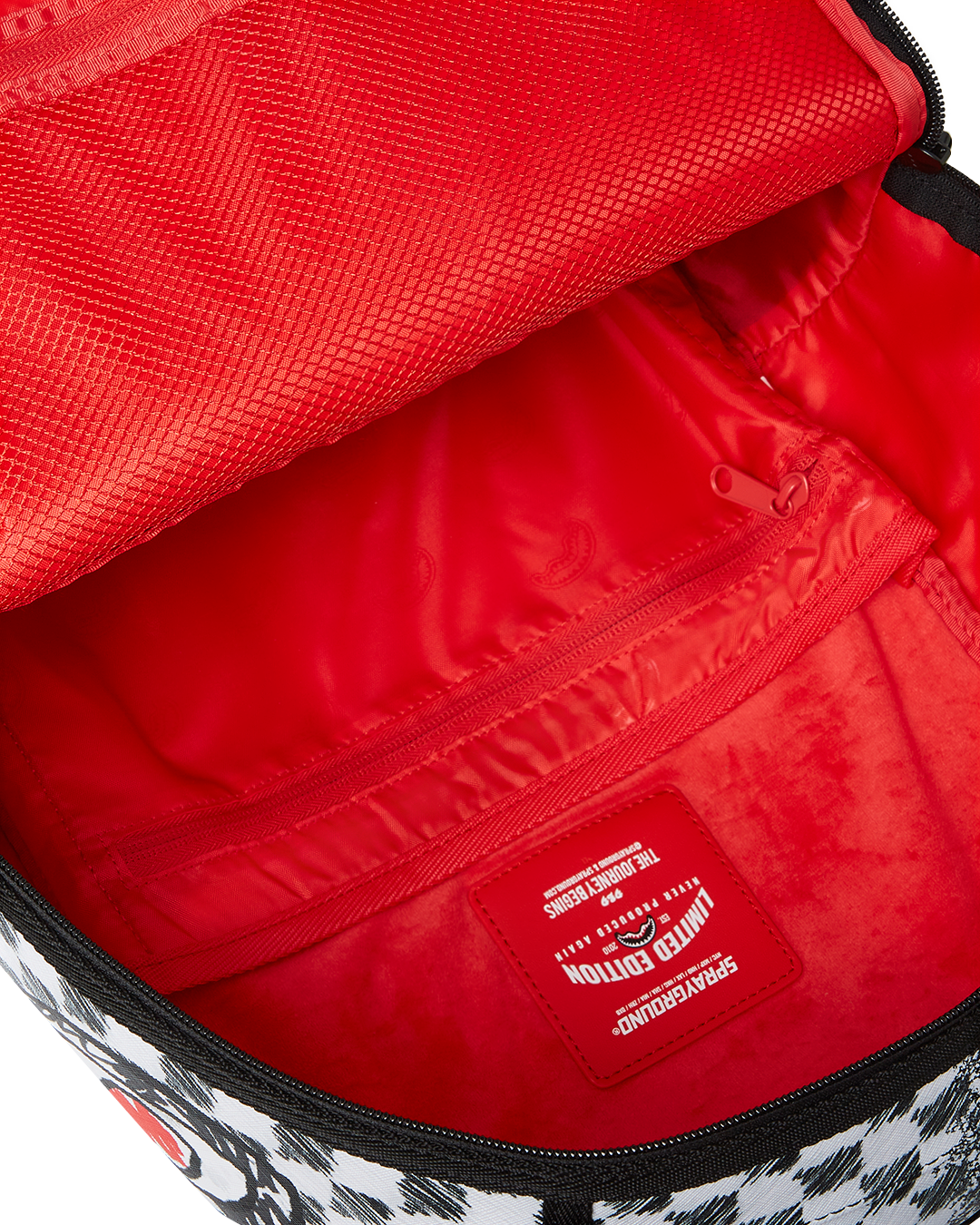 SPRAYGROUND SCRIBBLE DRIBBLE CHECK BACKPACK