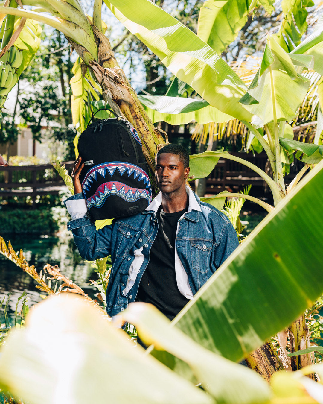 SPRAYGROUND A.I. AFRICAN INTELLIGENCE BORN AND RAISED BACKPACK - SANDFLOWER COLLAB