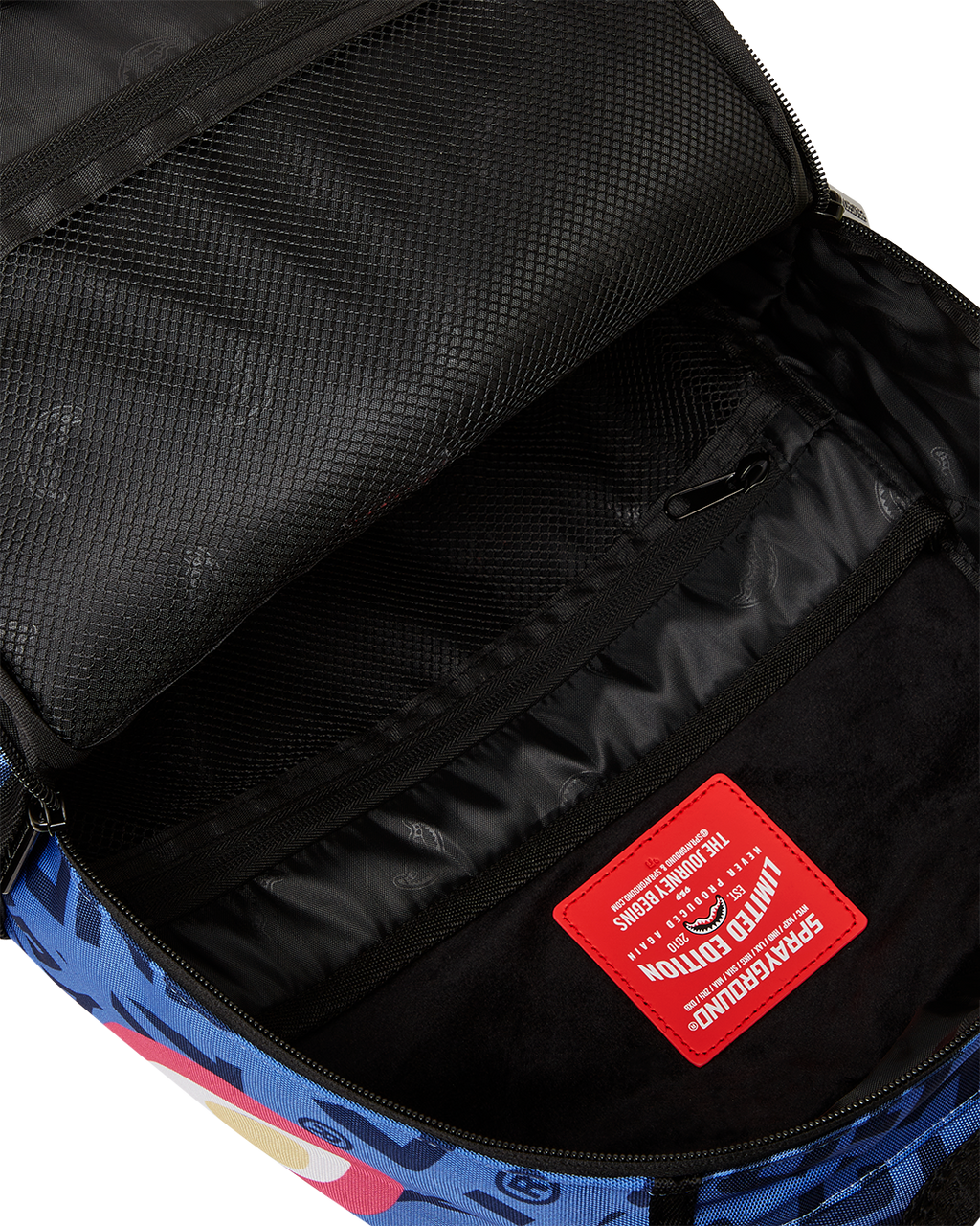 SPRAYGROUND FAMILY GUY: MEG SHARK MOUTH DLXR BACKPACK
