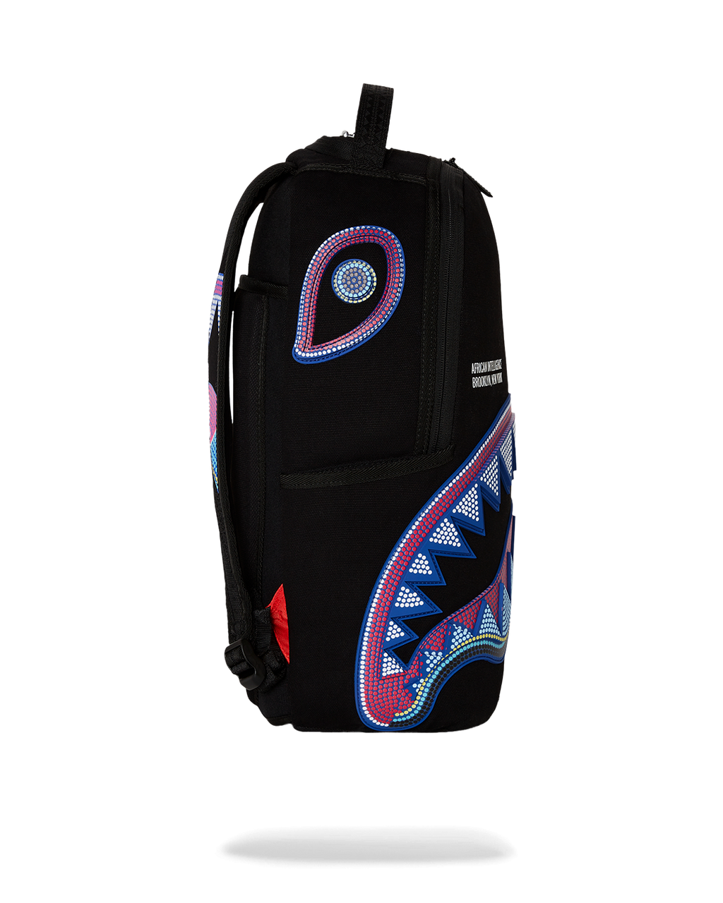 SPRAYGROUND A.I. AFRICAN INTELLIGENCE BORN AND RAISED BACKPACK - SANDFLOWER COLLAB