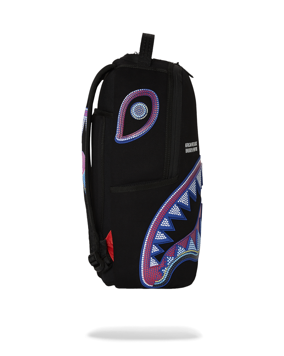 SPRAYGROUND A.I. AFRICAN INTELLIGENCE BORN AND RAISED BACKPACK - SANDFLOWER COLLAB