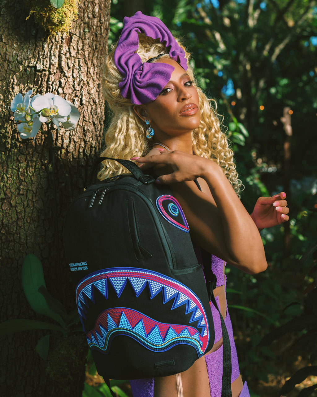 SPRAYGROUND A.I. AFRICAN INTELLIGENCE BORN AND RAISED BACKPACK - SANDFLOWER COLLAB