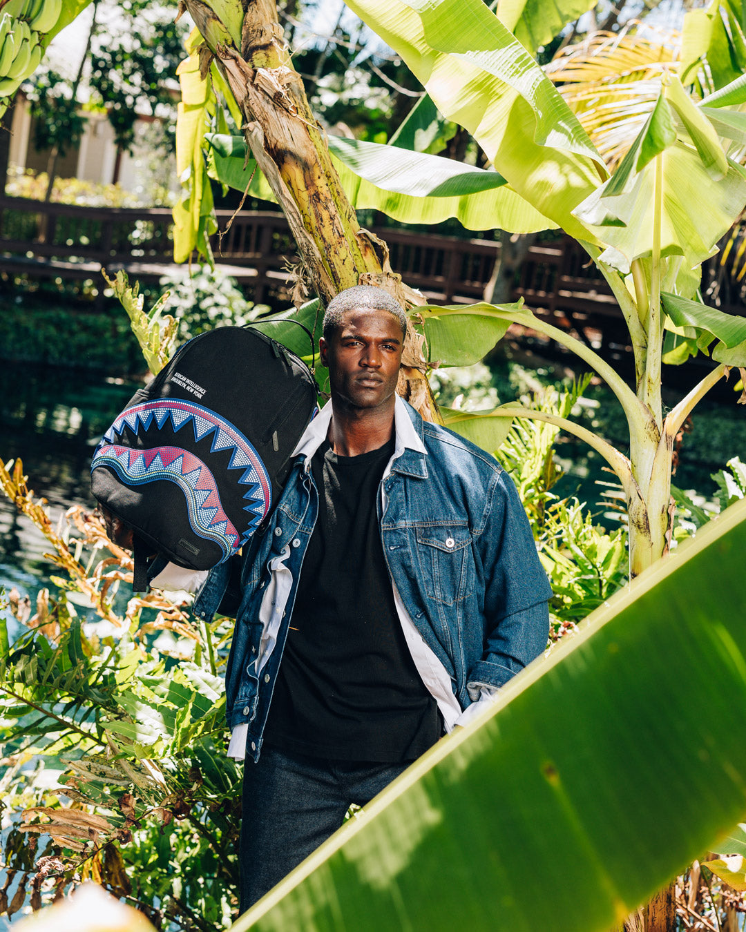 SPRAYGROUND A.I. AFRICAN INTELLIGENCE BORN AND RAISED BACKPACK - SANDFLOWER COLLAB
