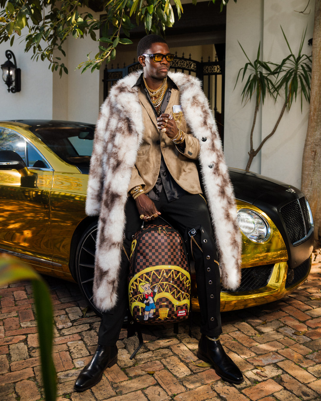 SPRAYGROUND RICHIE RICH PAINT THE SHARK GOLD BACKPACK